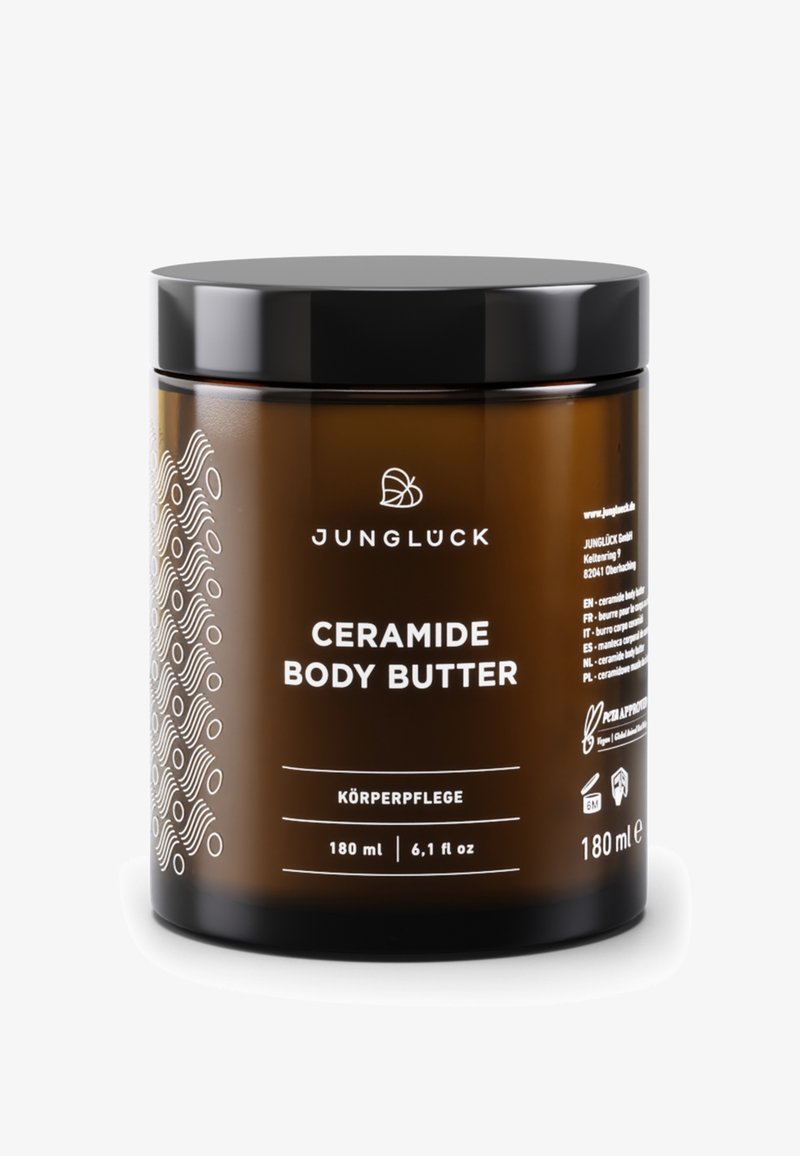 Amber jar with black lid, labeled "Ceramide Body Butter," white text, featuring a wave pattern on one side. Capacity: 180 ml.