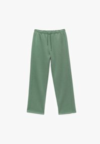 Grønne sweatpants lavet af blødt stof med elastisk talje og snor. Har sidesømme og lige ben.