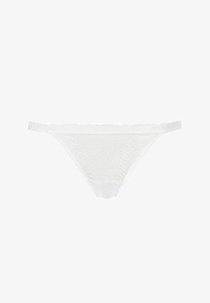 White lace thong with a chevron pattern, featuring a scalloped waistband and thin straps, designed for minimal coverage.