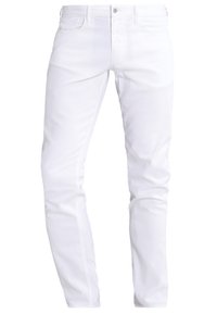 White denim pants with a slim fit, featuring a five-pocket design and standard zinc hardware. Smooth texture and clean lines.