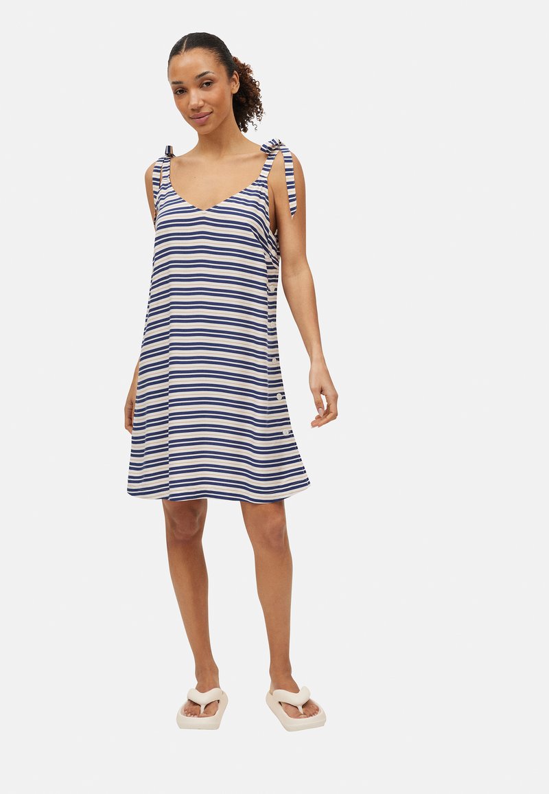Vestido sin mangas a rayas en azul y crema, con tirantes de lazo, corte holgado y dobladillo hasta la rodilla. Tejido suave con textura mínima.