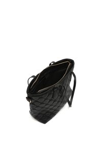 Sac fourre-tout matelassé noir en cuir, doté d'un dessus zippé, de deux poignées pour les épaules et d'une doublure intérieure lisse.