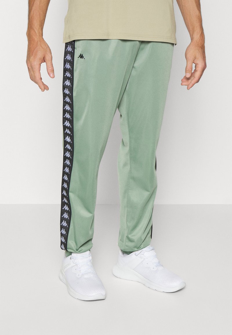 Kappa PANTS ZIPPER POCKET Tracksuit bottoms hedge green/green Zalando