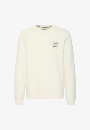 Lys cremefarvet sweatshirt med lange ærmer, rund halsudskæring, elastiske manchetter og kant. Har et broderet tekstdesign på brystet.
