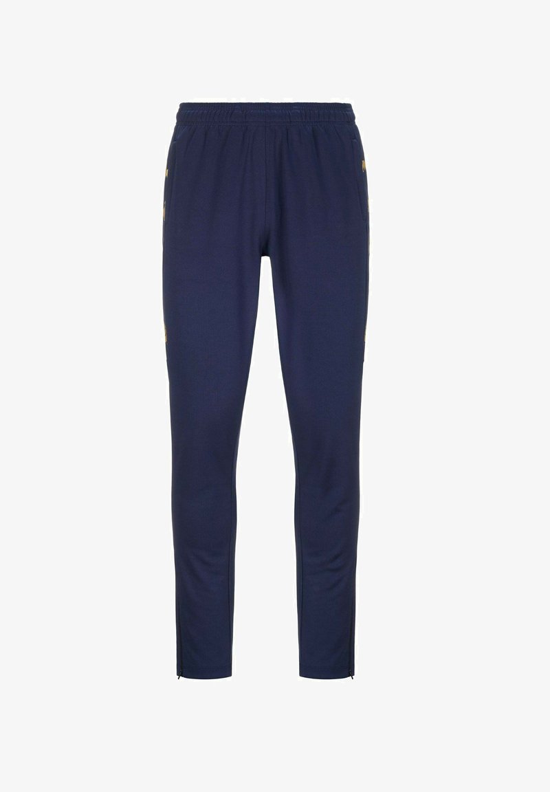 Pantalones deportivos de color navy con cintura elástica, piernas ajustadas y puños con cremallera. Fabricados con un tejido suave y detalles laterales amarillos.