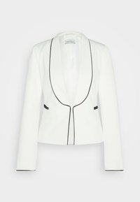 Blazer blanc ajusté avec un passepoil noir le long du revers, des poches et des poignets, doté d'un col châle et de manches longues.