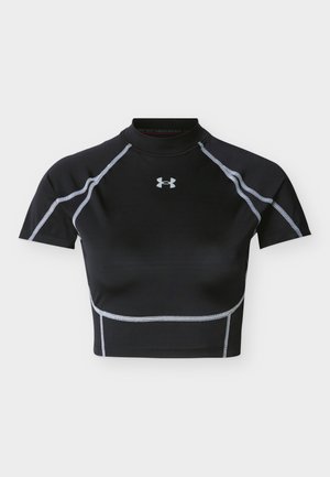 Crop top sportif noir à manches courtes avec surpiqûres blanches en contour et logo Under Armour réfléchissant au centre devant.