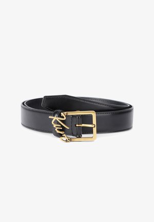 Black leather belt with gold rectangular buckle and cursive gold signature detail on a white background.
