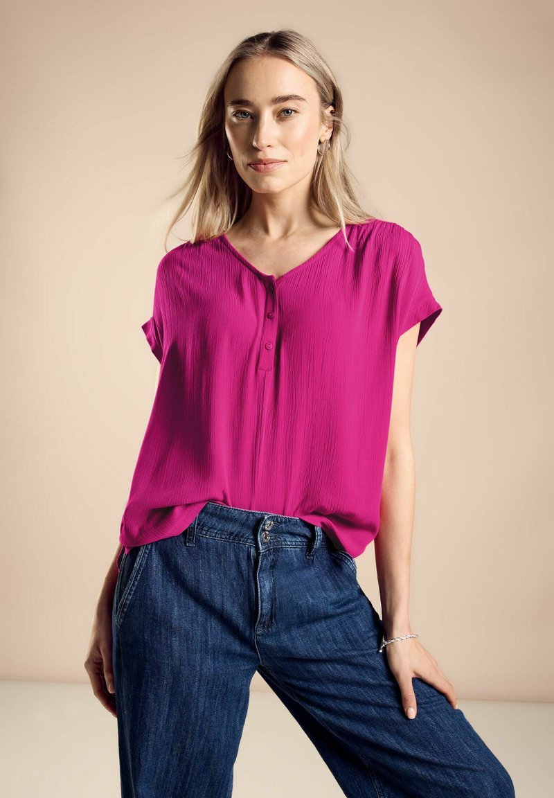 T-shirt de coupe évasée à paillettes réversibles - Rose | s.Oliver