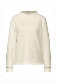 Felpa beige chiaro con collo alto e maniche lunghe. Tessuto morbido e polsini a coste, caratterizzata da una vestibilità comoda.