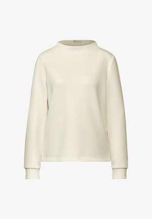 Felpa beige chiaro con collo alto e maniche lunghe. Tessuto morbido e polsini a coste, caratterizzata da una vestibilità comoda.