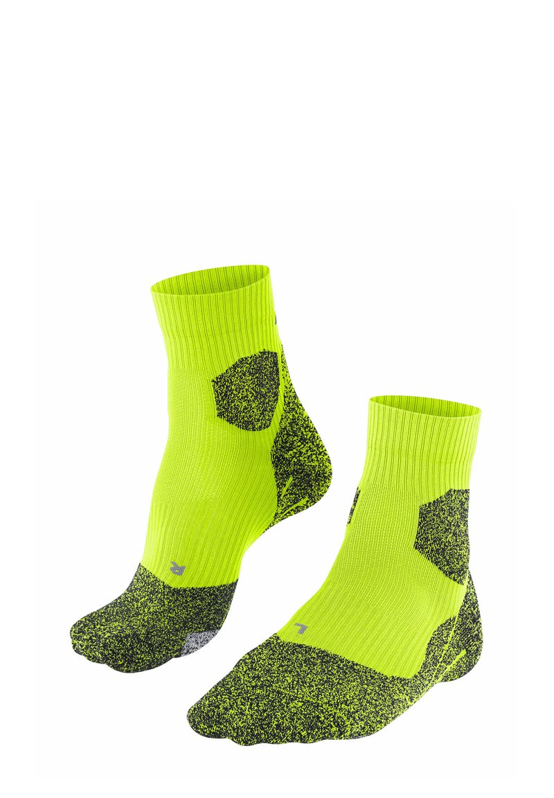 Neonowo-żółte skarpetki do kostki z czarną nakrapianą teksturą i sześciokątnymi akcentami. Prążkowany mankiet i wzmocniony palec dla większej wytrzymałości.