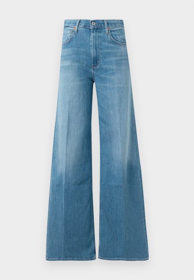 High-waisted, light blue denim jeans with wide legs, front button closure, and front pockets, displayed against a plain white background.