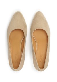 Beige suede slip-on flats with a pointed toe, featuring a smooth leather insole and contrasting stitching along the edges.