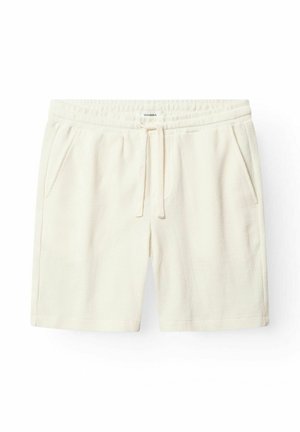 Off-white frottébukser med elastisk talje, snøre foran, sidelommer og et lille stofmærke med mærket i midten af taljen.