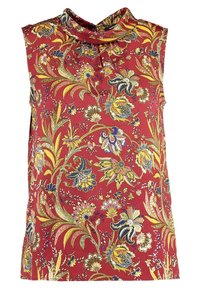 Top sin mangas de tejido rojo intenso con un patrón floral en azul, amarillo y blanco. El diseño incluye un escote drapeado y un ligero brillo.