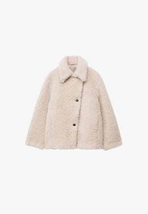 Light beige fleece jacket with a textured exterior, collar, and two large buttons at the front. Features a boxy shape and dropped shoulders.