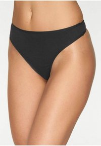 Black bikini bottom featuring a smooth elastic waistband and minimal coverage. The fabric appears soft with a matte finish.