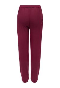 Bordeaux, lichtgewicht joggers met een elastische tailleband, taps toelopende benen en een gladde textuur. Eenvoudig ontwerp zonder zichtbare patronen of versieringen.