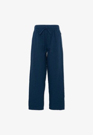 Pantalon ample bleu marine texturé avec taille élastique et cordon à l'avant, conçu pour une tenue décontractée ou de détente.