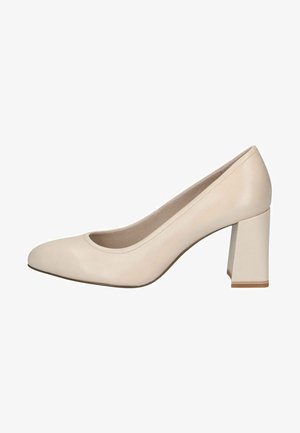 Pump in pelle beige con punta arrotondata e tacco spesso. Texture liscia con cuciture minime e una base solida.