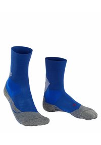 Calze sportive blu con un design a coste, tallone e punta rinforzati in grigio e una superficie testurizzata con un motivo geometrico sui lati.