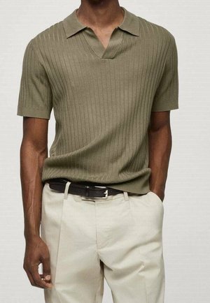 Khaki ribbed short-sleeve polo shirt with a V-neck collar. Paired with beige trousers and a black belt. Soft texture with structured design.