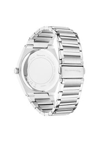 Edelstahlarmbanduhr mit achteckigem Gehäuse, massivem Gliederarmband, polierter und gebürsteter Oberfläche sowie graviertem Markenlogo auf der Schließe.