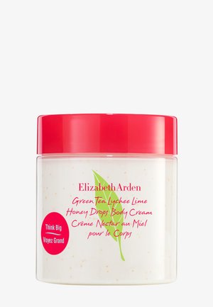 Crème pour le corps Elizabeth Arden Green Tea Lychee Lime Honey Drops dans un contenant blanc avec un couvercle rouge et un motif de feuille verte.