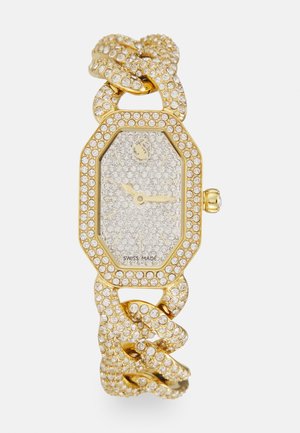 Goldfarbene Armbanduhr mit achteckigem Gehäuse, funkelnden Kristallverzierungen und einem Gliederarmband mit ineinander verwobenen Motiven. Schweizer Herstellung.