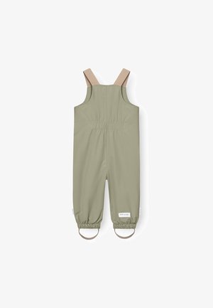 Šviesiai žali, vandeniui atsparūs kombinezonai su reguliuojamais smėlio spalvos petnešomis, elastingais rankogaliais ir etikete šone. Lygus paviršius, kasdienis dizainas.