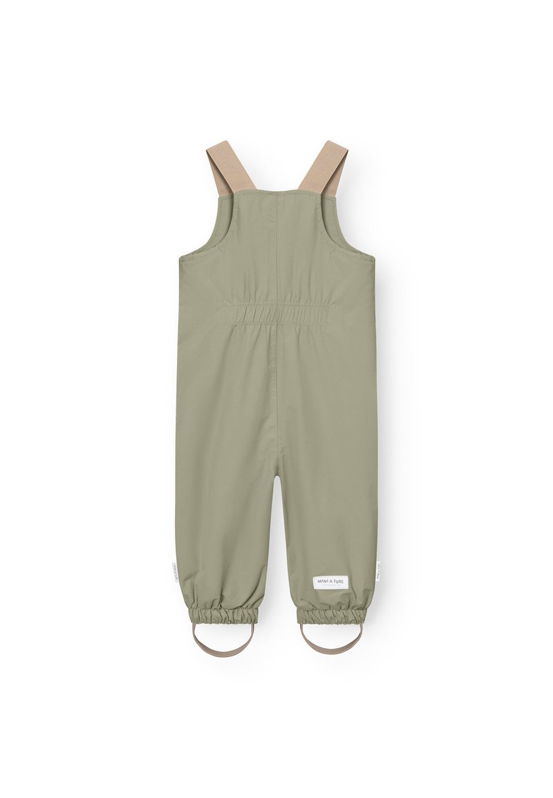 Overalls impermeabili di un verde chiaro, con spalline beige regolabili, polsini elasticizzati e un'etichetta sul lato. Tessuto morbido, design casual.