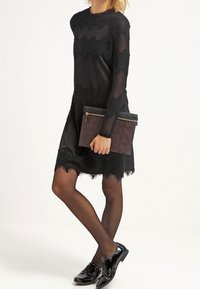 Cream Jerseyklänning - black