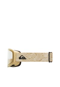 Lyžařské brýle s béžovým rámem, čirým sklem a nastavitelným béžovým popruhem s bílým topografickým vzorem a černým logem.