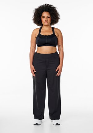 STYLISCHE MIT LEICHT AUSGESTELLTEM  - Verryttelyhousut - black