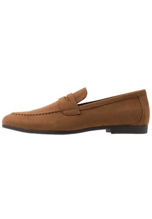 Brown suede men's loafer with low black heel and classic penny strap detail, shown in side profile on white background.