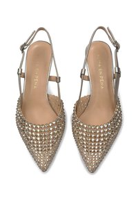 Beige pointed-toe slingback heels with a rhinestone-encrusted design, thin ankle straps, and a smooth inner lining.
