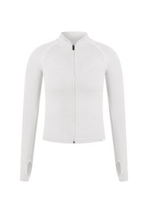 Veste blanche zippée avec manches longues, texture côtelée et col montant. Dotée d'ouvertures pour les pouces et de coutures plates pour un confort optimal.