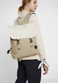 enter city backpack mini  City Zip will house your essentials while youre out and about Kipling Women's City Pack Mini