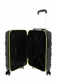Valigia rigida nera con accenti verde lime, dotata di interni con zip, cinghie, tasche in rete e ruote a 360 gradi.