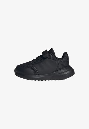 Sneaker neri per bambini con tomaia in mesh testurizzato, dettagli sintetici, strap in velcro e suola imbottita per il comfort.