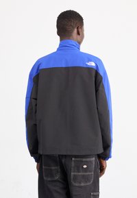 The North Face EASY WIND TRACK JACKET - Suvejakk - blue/black