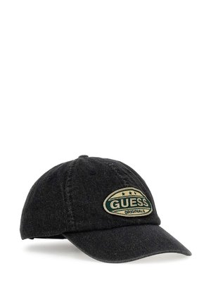 Black denim baseball cap featuring a green and beige "GUESS ORIGINALS" patch with stars, curved visor, and stitched detailing.