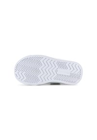 White rubber sneaker sole featuring a zigzag pattern, with a slightly raised heel and smooth edges. Durable and flexible design.