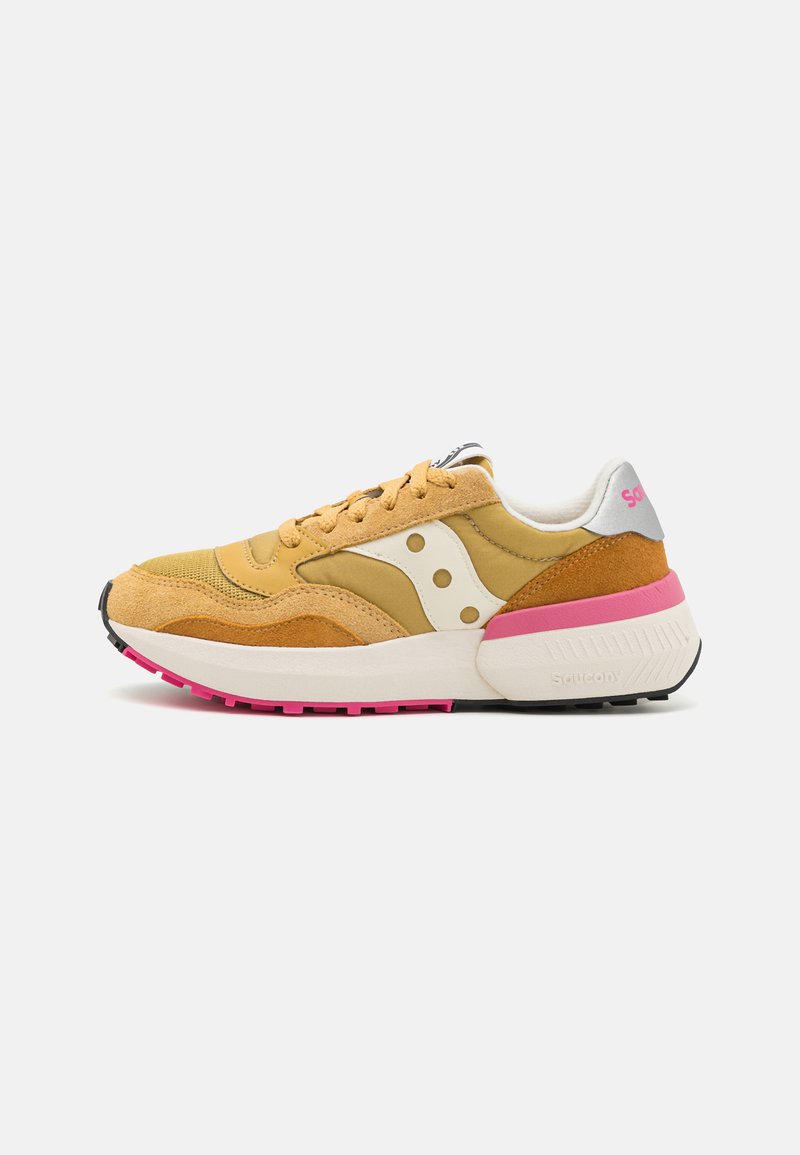 Sneakers with a blend of yellow suede and mesh, white accents, pink heel, and a textured black outsole. Features rounded toe and lace closure.