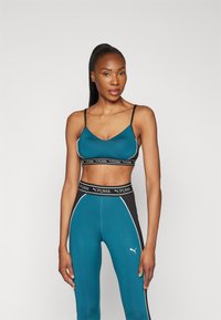 Puma MOVE STRONG - Športni modrček z rahlo podporo - cold green