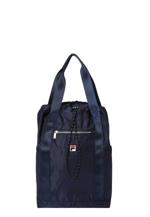 Laivastonsininen kangaskassi, jossa on kaksinkertaiset olkahihnat, etutasku vetoketjulla, nyörikiristys ja pieni punavalkoinen sininen logoplässi.