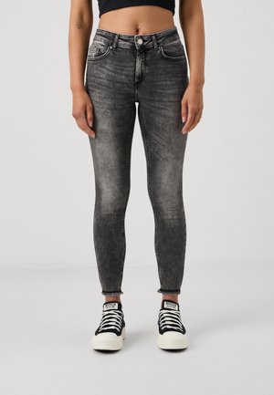 Vaqueros pitillo - grey denim