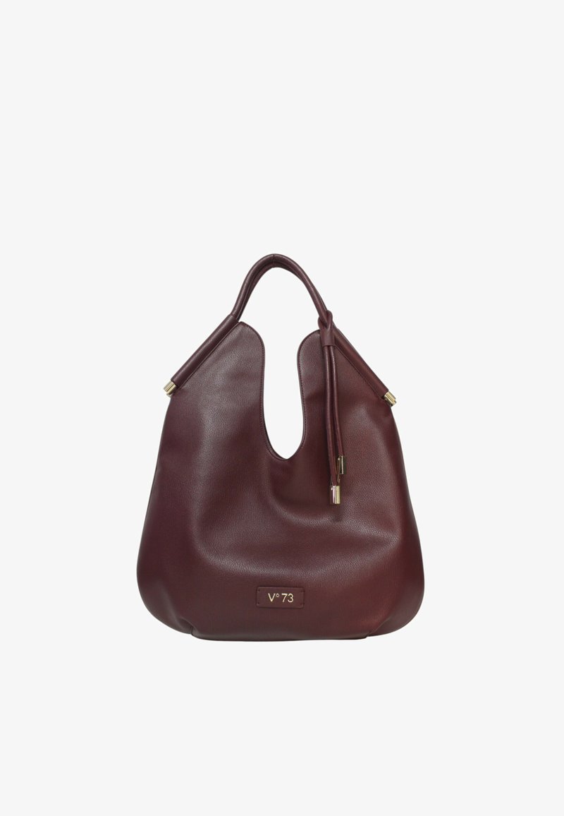 Borsa a mano in pelle bordeaux con un design unico del manico sagomato, texture liscia e dettagli in metallo color oro. Logo visibile sul davanti.