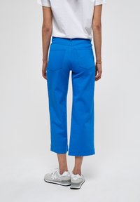 Desires DEFLORENCE PANTS - Traperice krojene za nošenje s čizmama - french blue